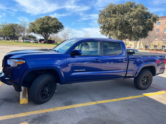 Before and after window tinting on Toyota Tacoma